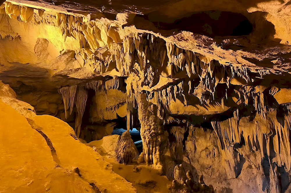 Most visitors are attracted by the fascinating cave system at the source of Thang Hen Lake